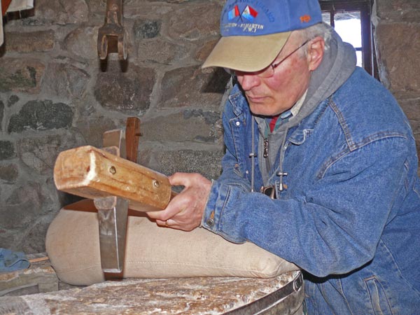 Rich at Grist Mill dressing quartz wheel